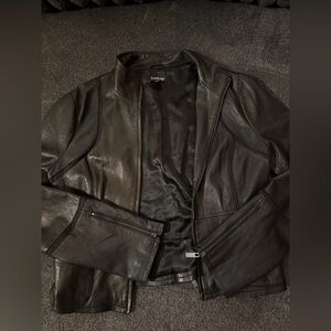 Cute 100% leather Bebe jacket, Medium. gives a cute worn vintage look